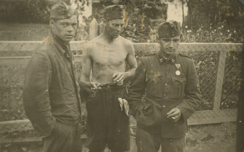 A group of men standing next to each other.
