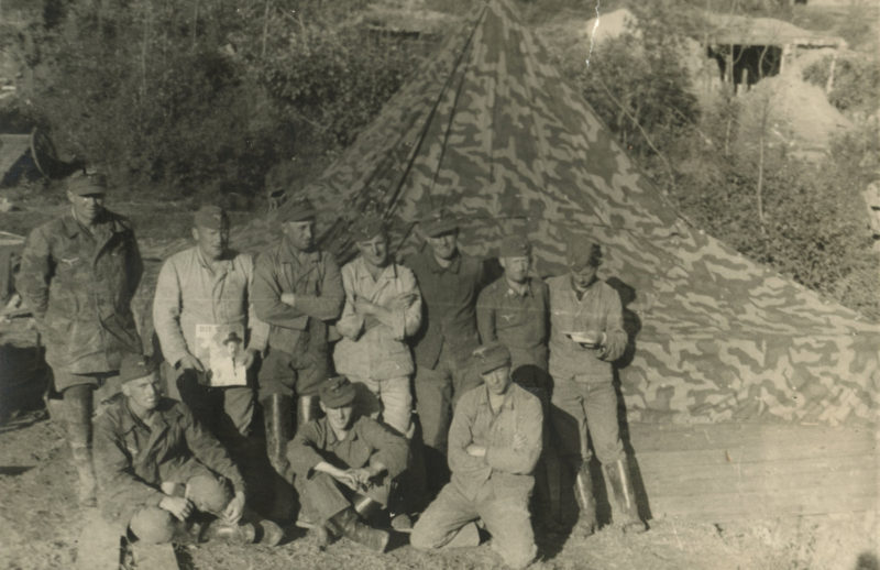 A group of men standing next to each other.