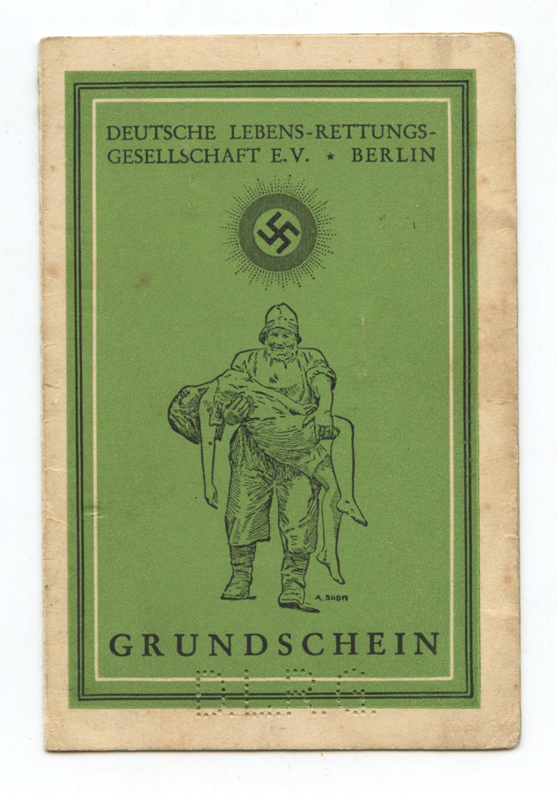 A green book with an illustration of a man holding two people.