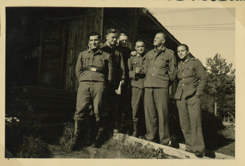 A group of men standing next to each other.