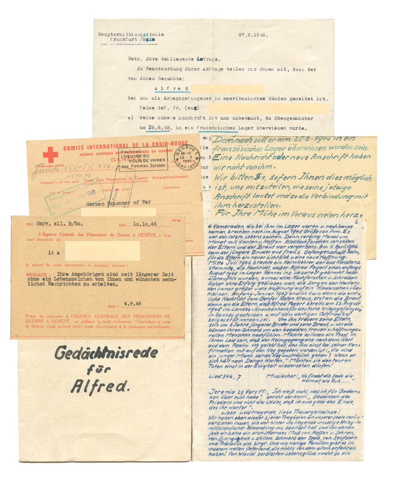A collection of letters and envelopes from the red cross.