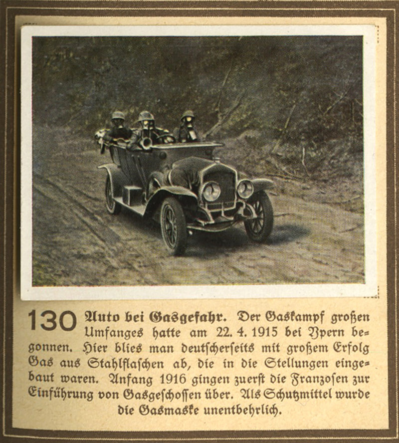 A picture of an old car with people in it.