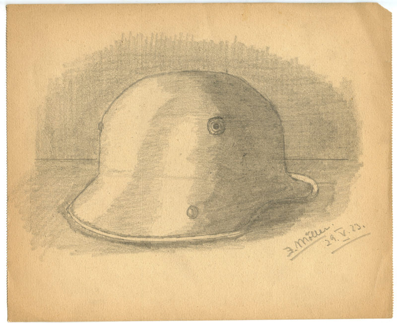 A drawing of a helmet on top of paper.